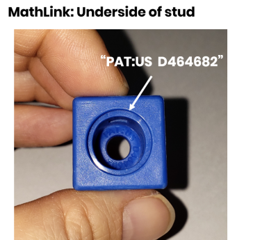 MathLink – underside of stud MathLink Cube - embossed letters on underside of stud 'PAT:US D464882'